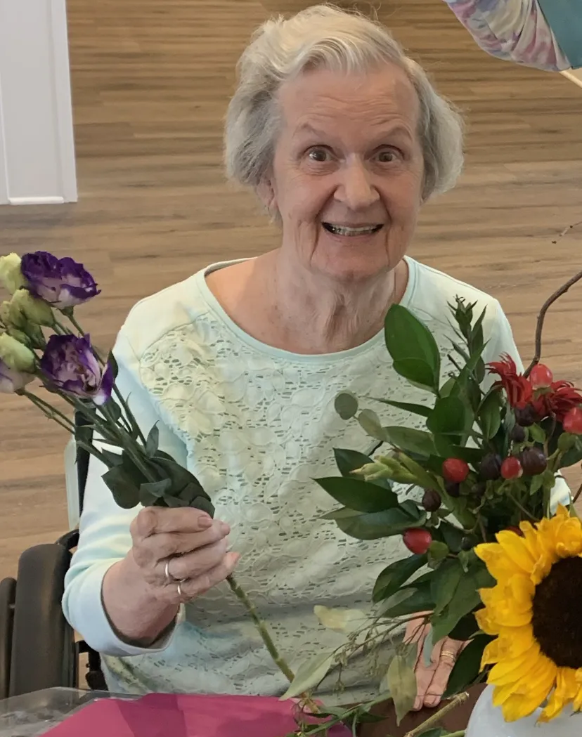 Sue-pic-woman-with-flowers--1920w 1